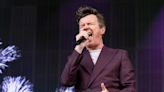 80s icon performs 'hated' song on back of trailer in surprise Latitude set