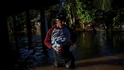 Floods batter Brazil as world confronts extreme weather