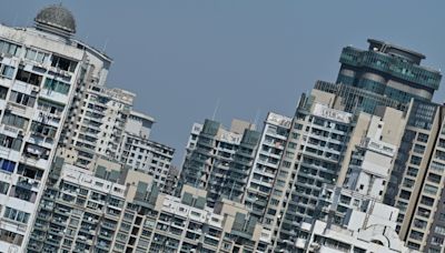 Shanghai lifts home-buying curbs to boost property sector