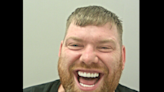 Police hunt grinning 'Turkey teeth' suspect Gary Herbert, 37