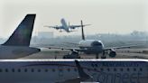 Other passengers support man who opened emergency exit and walked on plane's wing in Mexico airport