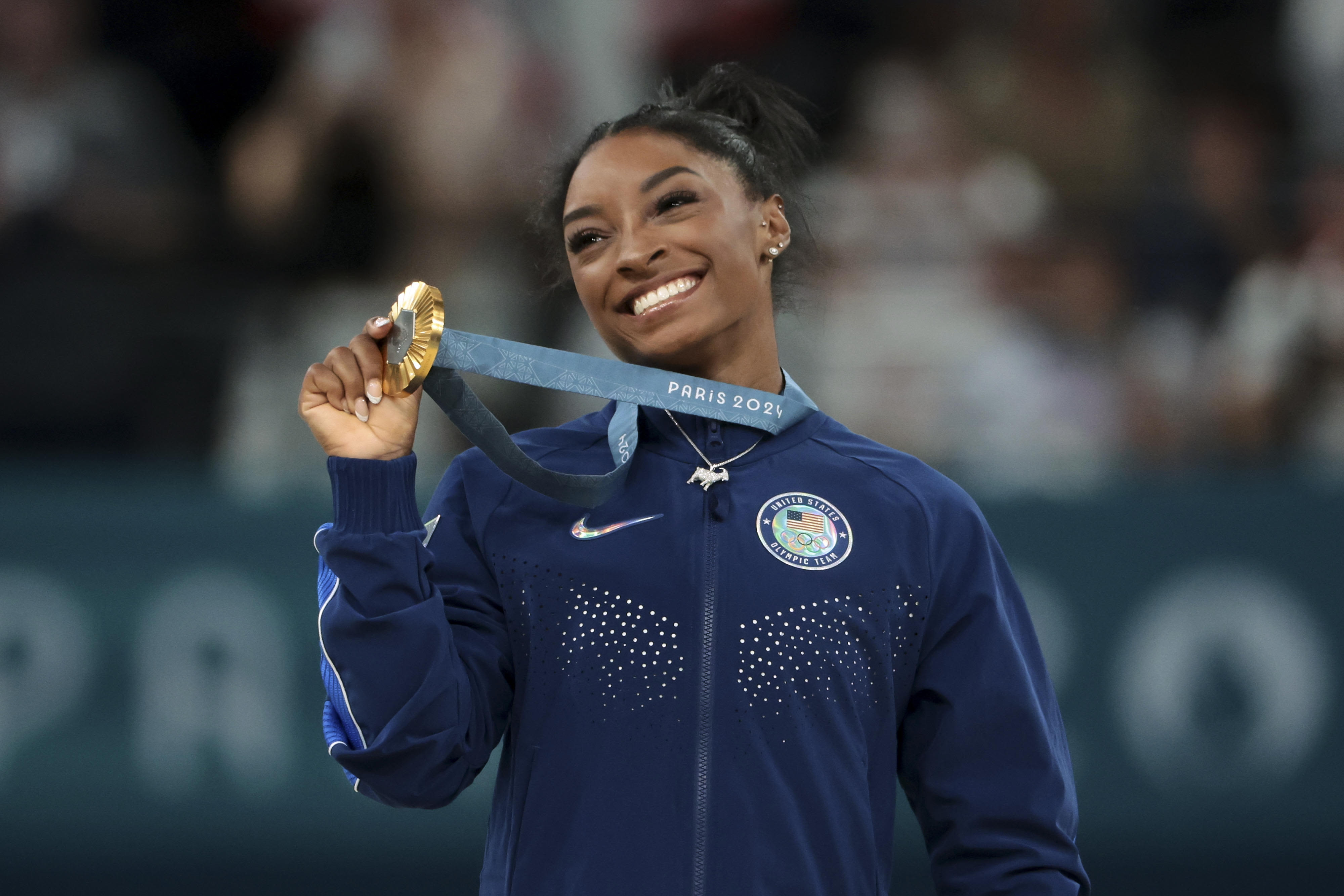 Simone Biles tweets, "I love my black job"