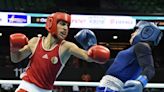 Controversial Algeria boxer who had gender test issue, wins at Olympics