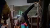 Yoga in a basement helps people in a Ukrainian front-line city cope with Russia's constant shelling