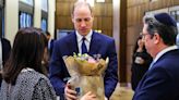 Prince William Accepts Flowers for Kate Middleton as He Returns to Duty After Pulling Out of Service