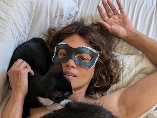 Halle Berry goes topless to celebrate 20 years of Catwoman