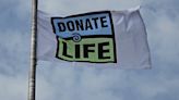 Med Center holds flag raising ceremony for Donate Life