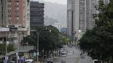 Normally bustling Venezuelan capital is unusually quiet after both sides claim victory in election