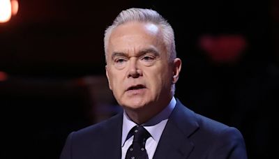 BBC boss Tim Davie defends paying Huw Edwards his full annual salary