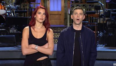 Dua Lipa Shuts Down Mikey Day Trying to Show Off ‘Wild ’N Out’ Rap Skills in ‘SNL’ Promo | Video