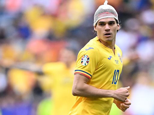 Fans left baffled as Romania star Ianis Hagi wears NETTING on his head