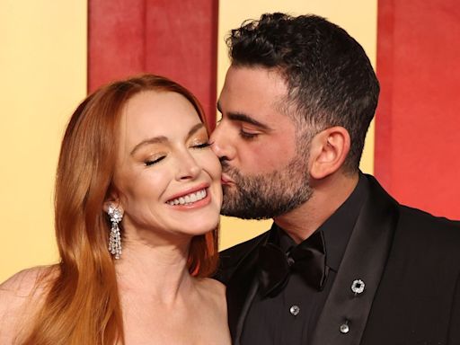 Lindsay Lohan's fans say the same thing as she cozies up to husband Bader Shammas in photos from lavish 38th birthday party