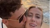 Patrick Mahomes kisses his wife Brittany on boat ride in Portugal