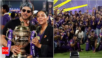 Shah Rukh Khan and Gauri Khan pose with IPL trophy, recreate Harshit Rana's flying kiss gesture with KKR team | Hindi Movie News - Times of India