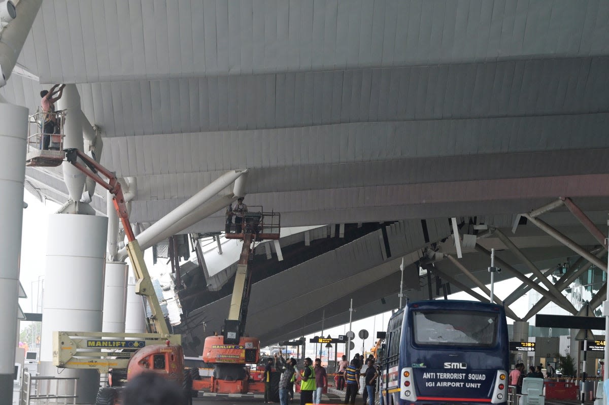 Delhi airport roof collapse leaves one person dead as heavy rains hit India capital