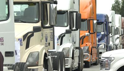 B.C. port truckers protest licensing changes in rolling convoy