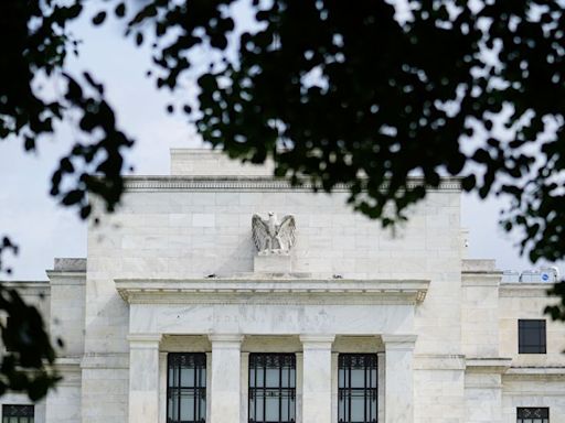 Fed officials steer cautiously toward potential rate cuts