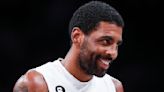 Irving rejoins Nets, seeks to keep focus on basketball