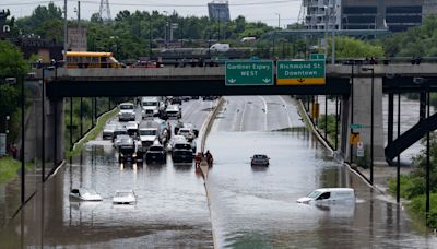 An 'indoor waterfall' at Union Station: Downtown Toronto flooded as severe storm disrupts life in the region