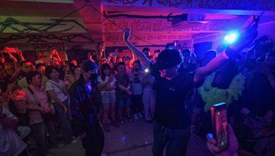 Bass beats bring Shanghai's deaf and hearing clubbers together