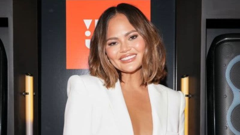 Chrissy Teigen Paired Her Tiny Hot Pants With a Plunging Blazer With the Biggest Bow