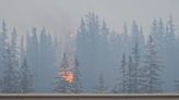 Wildfire burns structures in a town in the Canadian Rockies’ largest national park