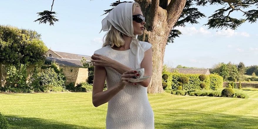 Elsa Hosk Pairs Her Knitted White Midi Dress With Chunky Thong Sandals