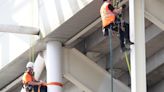 Workers scale Old Trafford to look at leaky roof after Man Utd vs Arsenal