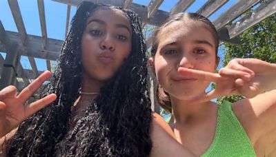 Penelope Disick, 11, tosses up peace sign in rare appearance with cousin North West, 10, during Turks & Caicos vacation