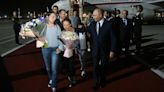 Vladimir Putin greets children of 2 freed sleeper agents, who learned they were Russians on flight, in Spanish. Watch