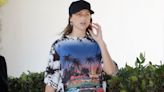 Lala Kent covers up her baby bump with a busy 'Diner' shirt