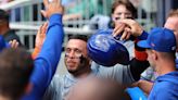 Francisco Alvarez of the New York Mets reacts after scoring in the third inning against the Atlanta Braves at Truist Park on April 11, 2024, in Atlanta.