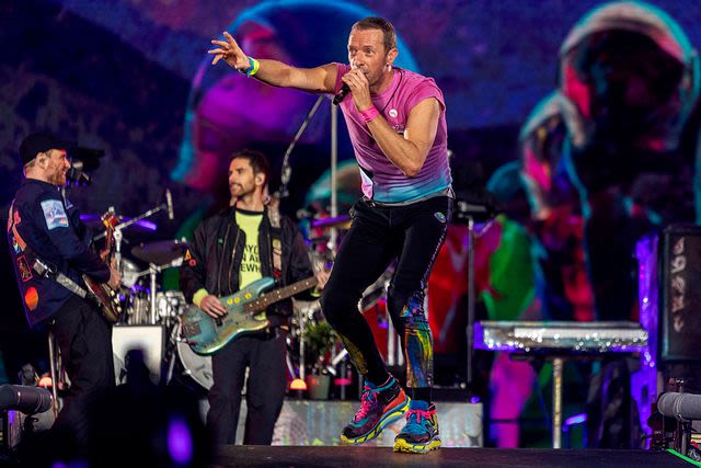 Coldplay halts concert in Athens after comedian attempts to rush stage with Israeli flag and falls