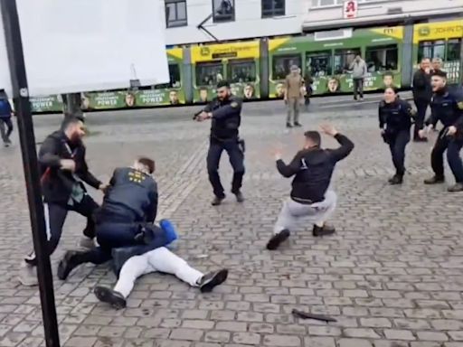 Police shoot man who stabbed far-Right activist and five others at political rally