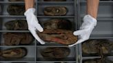 Auschwitz museum begins emotional work of conserving 8,000 shoes of murdered children