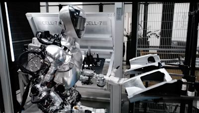 Humanoid robot gets to work in BMW assembly plant