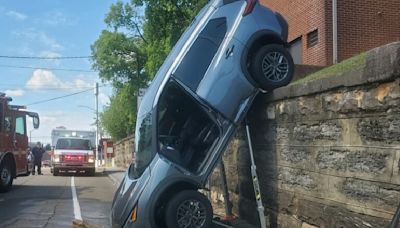 ‘Never a dull moment:’ Knoxville firefighters respond after car drives off retaining wall