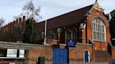 Trespasser camps on school's roof for four days with pupils forced to stay home