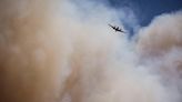 Cooler temps and rain could help corral blazes that forced thousands to flee New Mexico village