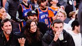 Irina Shayk Nails NBA Courtside Style in Thigh-High Leopard-Print Boots