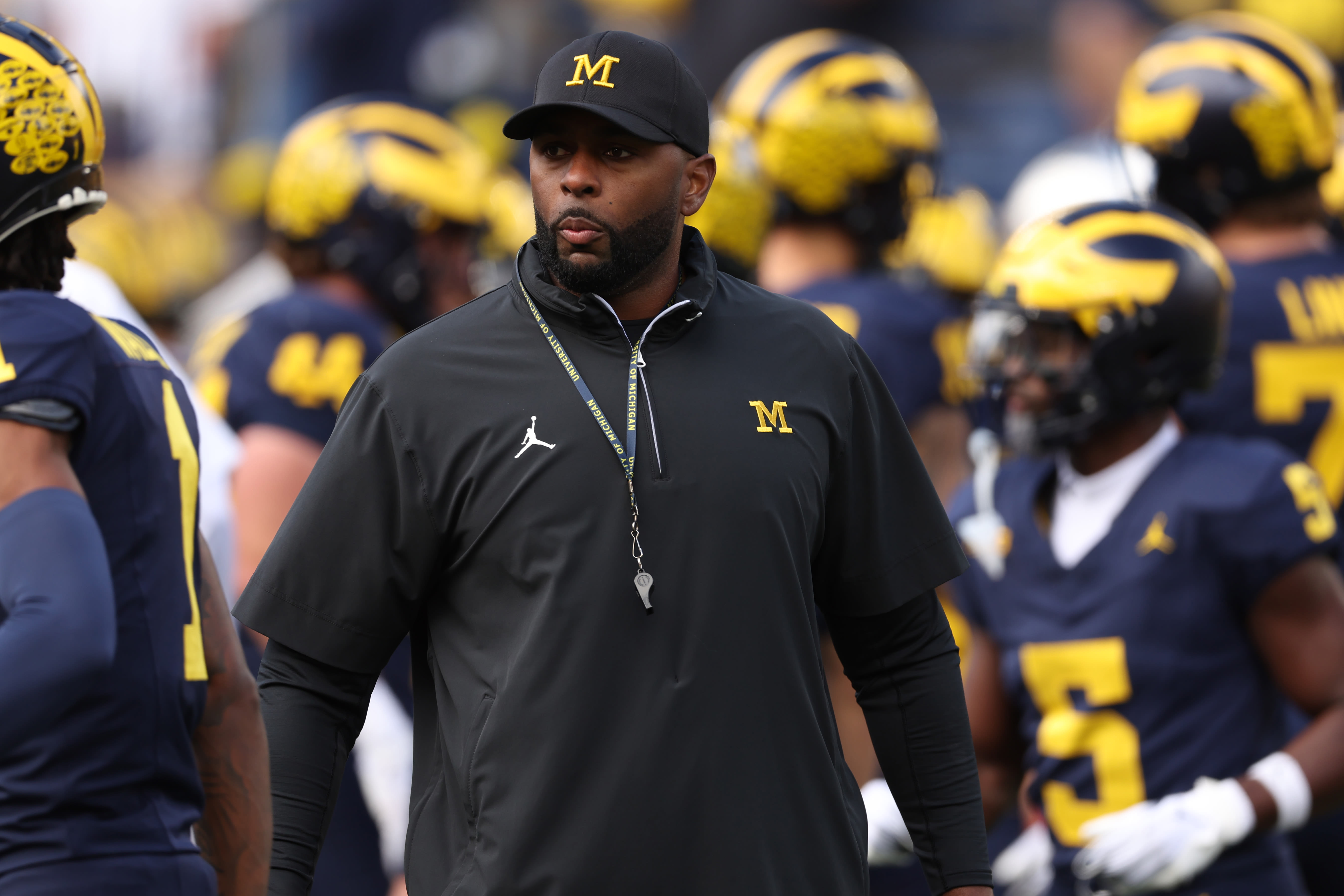 Michigan coach Sherrone Moore officially signs contract