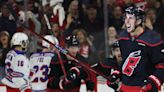 ...Carolina Hurricanes' Brady Skjei celebrates after scoring a goal against the New York Rangers during the third period in Game 4 of the Eastern Conference second-round playoff...