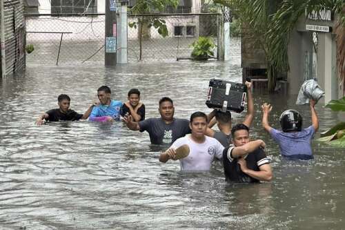 Typhoon killed 13 in Philippines, where people plead for rescue; storm kills 3 as it nears Taiwan