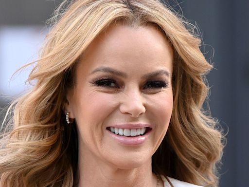 Amanda Holden stuns in mini dress alongside lookalike daughters during Greek getaway