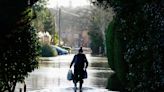 Residents evacuated from flood-hit village outside London as rising Thames river water levels hits properties