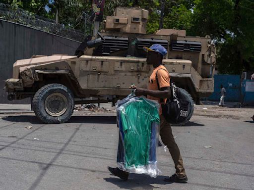 Haiti's transitional council names new prime minister in hopes of quelling stifling violence