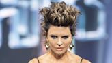 Lisa Rinna rocks bodysuit with leopard-print coat – and big hair! – for fashion week