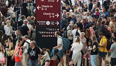 Airports fill with long lines and broken blue screens following cancellations and delays due to global IT outage