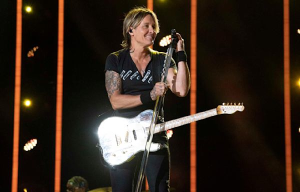 Keith Urban says 'High' is about order and chaos, with songs about love, life and his late father