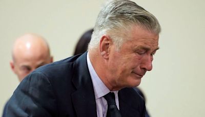 Alec Baldwin weeps in court as judge dismisses manslaughter case against actor after fatal shooting on film set